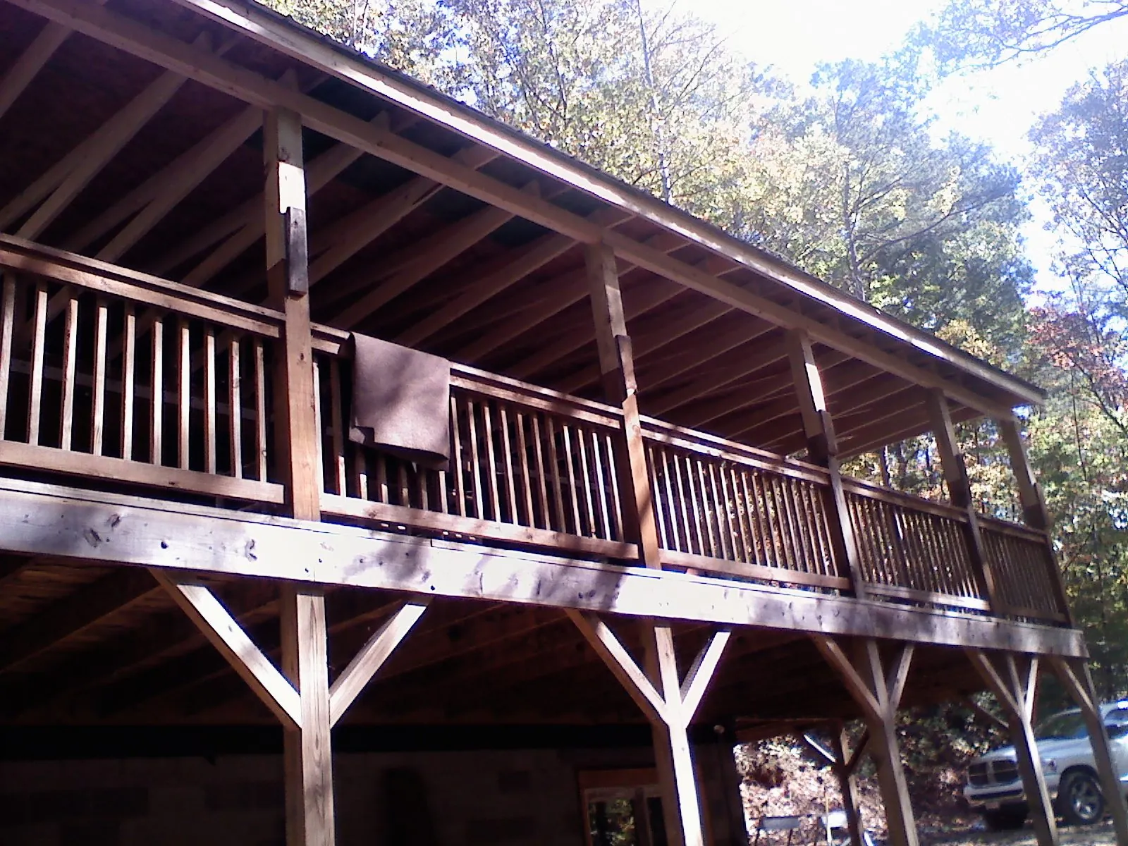 Timber framing under a new elevated porch and deck — Roof Leak Repair in Mount Hope by Roofing Brothers